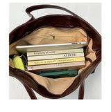 Luxury PU leather handbag for women featuring a spacious design, shoulder strap, and stylish crossbody style for commuting and office use.
