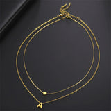 Tiny heart initial necklace for women, gold and silver layered charm by HSF Marketplace