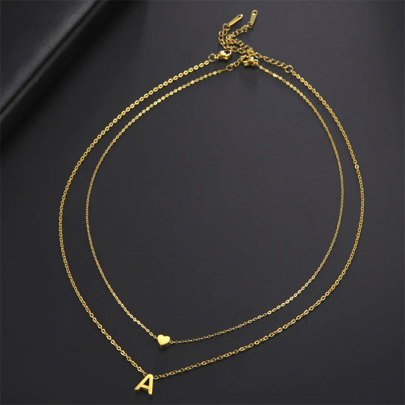 Tiny heart initial necklace for women, gold and silver layered charm by HSF Marketplace