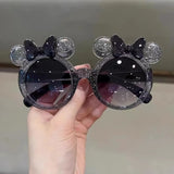 Cute crystal bow girls sunglasses by HSF Marketplace featuring shiny, personalized cartoon-style eyewear for children.