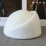Women's warm wool blend winter beret hat in an elegant style by HSF Marketplace