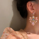 Pink crystal bowknot drop earrings for women, trendy statement jewelry by HSF Marketplace