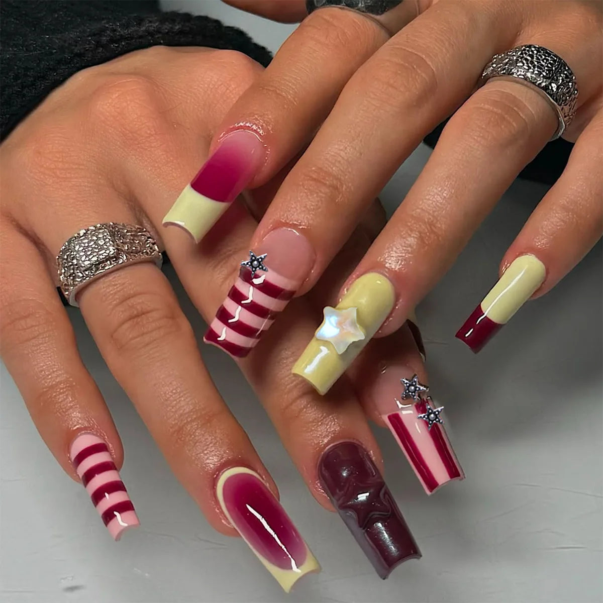 24-piece Sweet Punk pink and black long coffin press-on false nails with French, polka dot, and striped designs