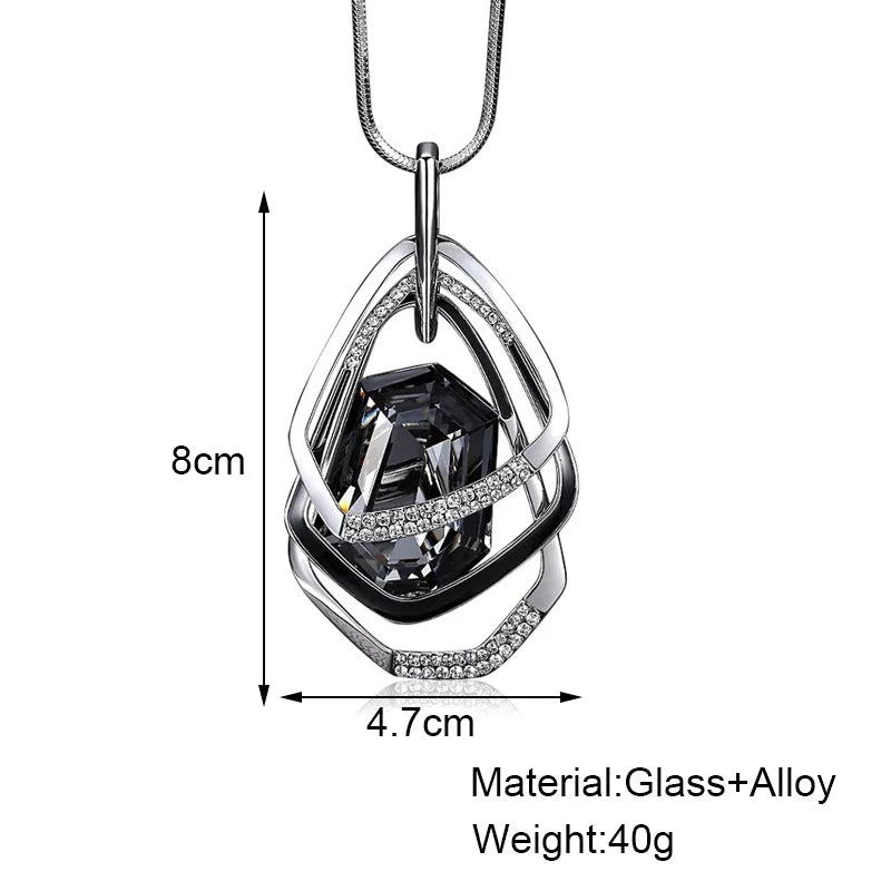 Long geometric chain necklace for women featuring a modern pendant, stylish jewelry accessory for a statement look.