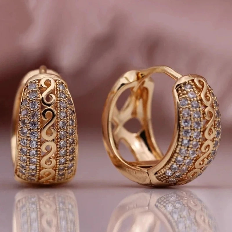 Hand-carved hollowed zirconia hoop earrings for women by HSF Marketplace, featuring an open sculpted design