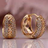 Hand-carved hollowed zirconia hoop earrings for women by HSF Marketplace, featuring an open sculpted design