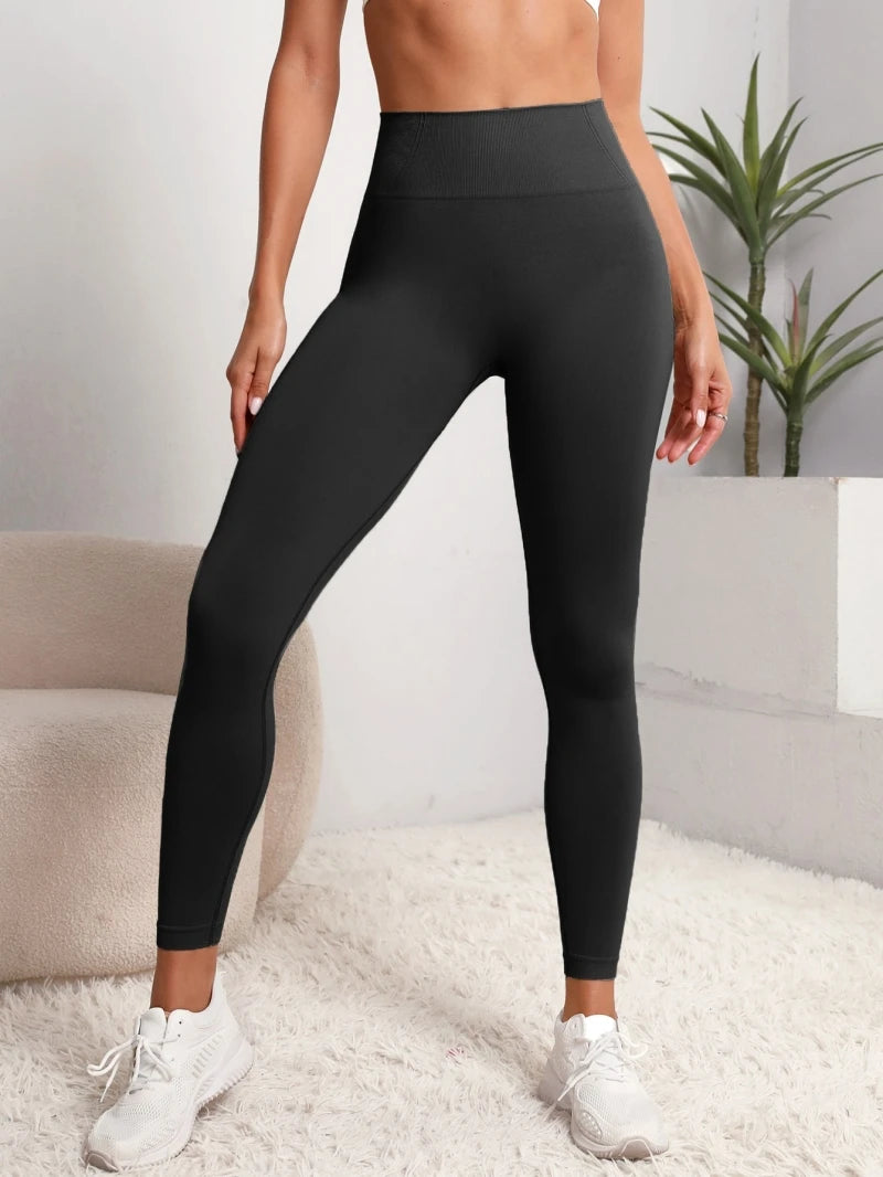 Women's seamless high waist hip lifting sports leggings for yoga, fitness, and gym workouts