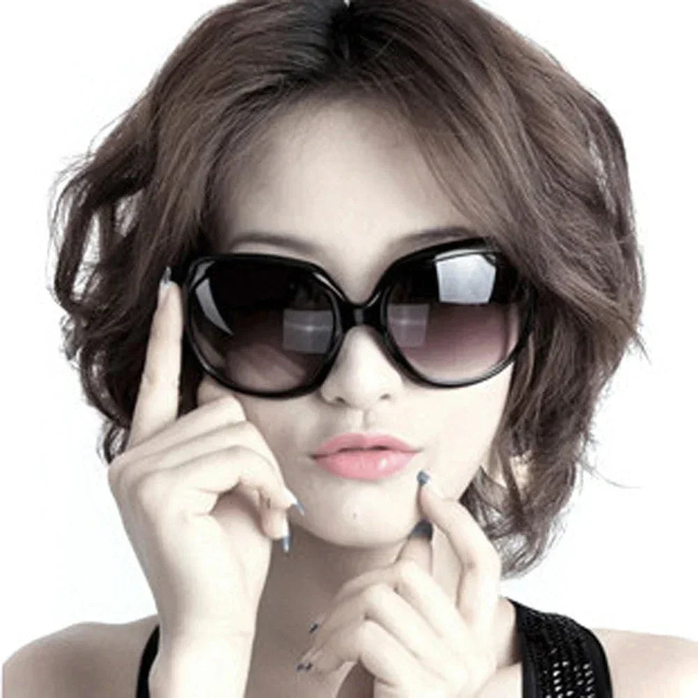 Retro oval shape women's sunglasses by HSF Marketplace featuring classic design and stylish frame, perfect for fashion-forward looks.