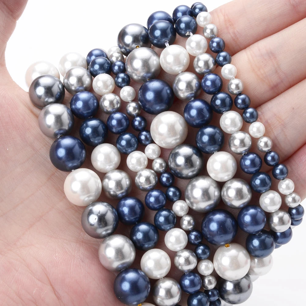 Natural freshwater shell pearls beads for jewelry making, displayed as loose round craft beads