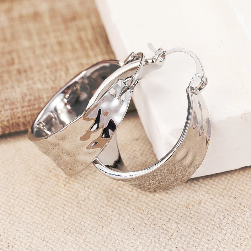 Silver plated hammered hoop earrings for women by HSF Marketplace