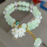 Colorful Lily Valley Flower bracelet with crystal beads for women, elastic jewelry for wedding and birthday celebrations.