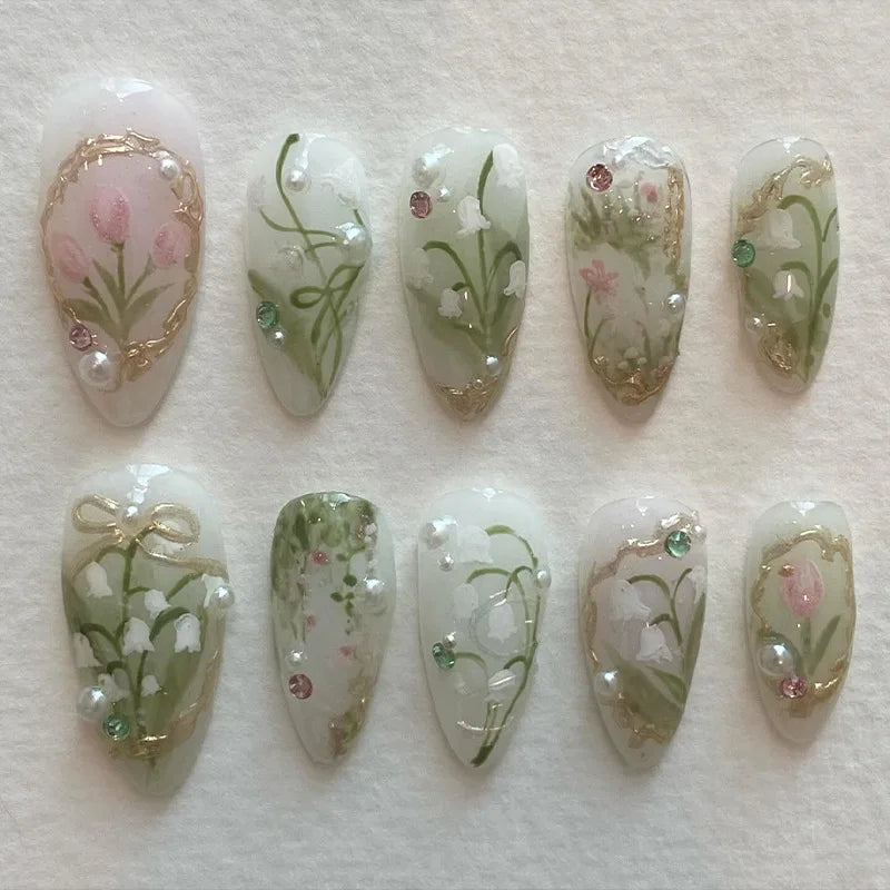 24-piece pink almond press-on false nails with bowknots, love hearts, and pearl design by HSF Marketplace