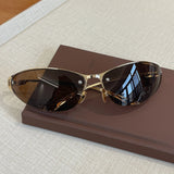 Harajuku women’s cat eye sunglasses with half-frame metal design and gradient lenses