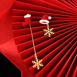Moving Santa Claus tassel dangle earrings in festive red and white design by HSF Marketplace