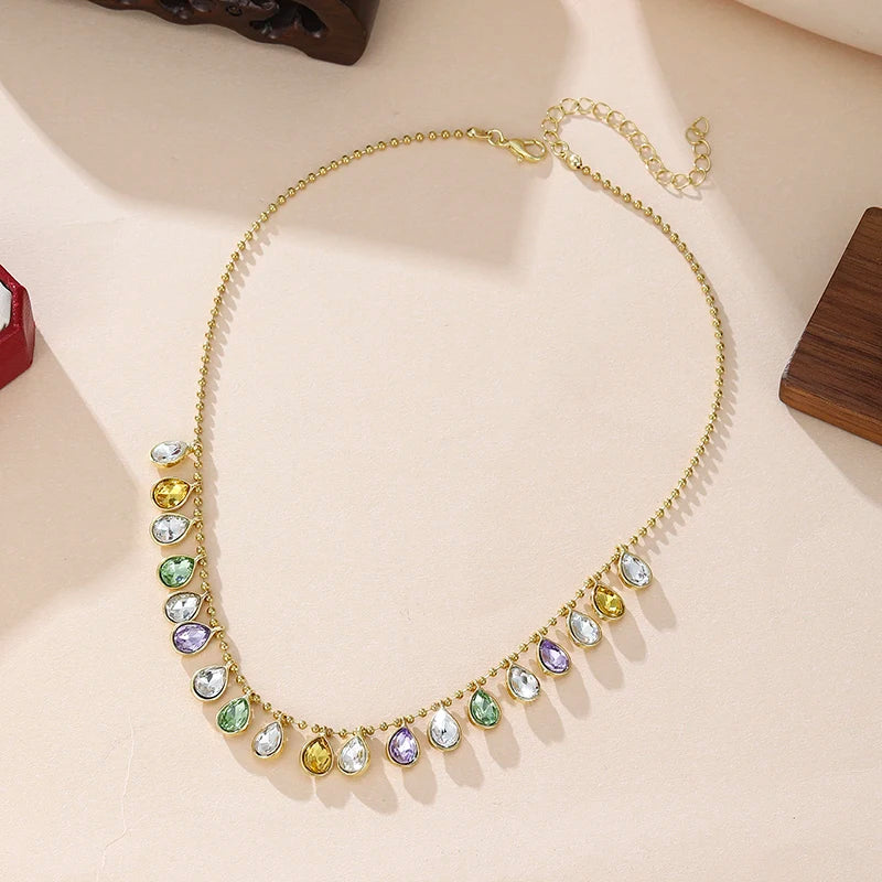 Bohemian multicolor teardrop crystal necklace with gold plating and water drop CZ pendant, delicate statement jewelry for women.