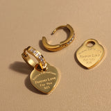 XE-221 heart pendant women’s zircon stainless steel earrings in gold color with charm jewelry design