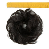 Elegant messy bun hairpiece with curly waves, real human hair, natural fluffy ponytail extension for women