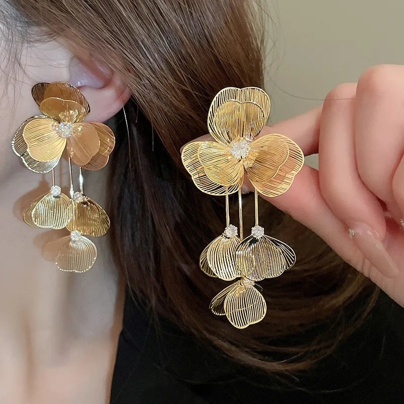 Golden vintage butterfly flower pendant earrings by HSF Marketplace for weddings and parties