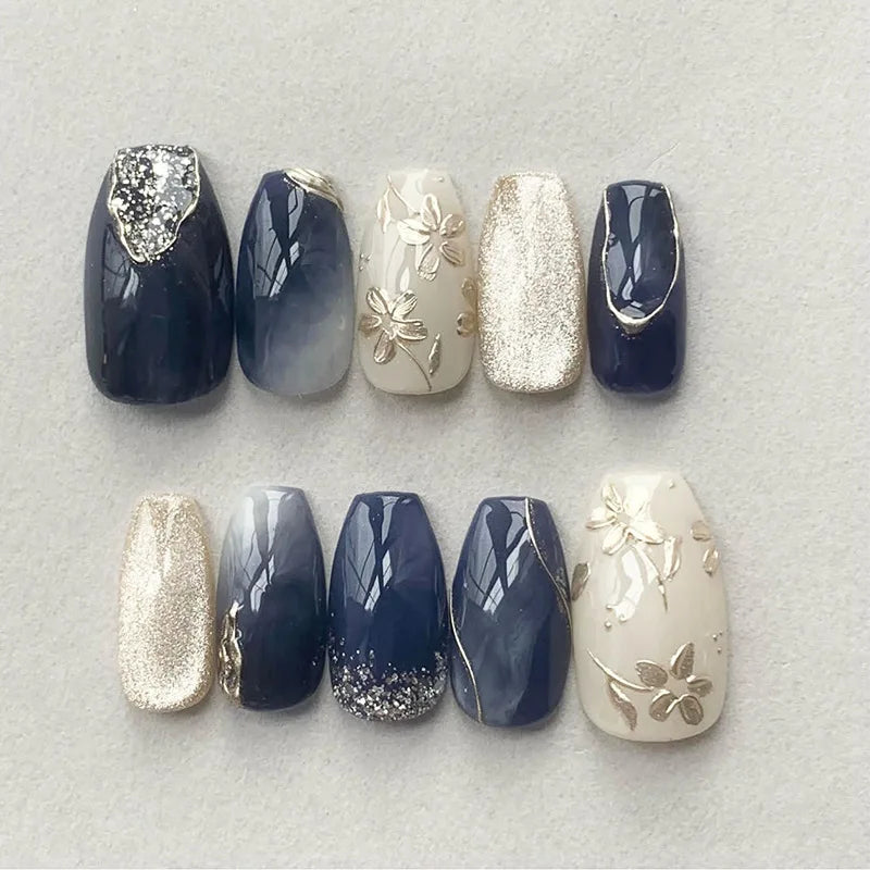 24-piece Y2K gradient blue French press-on false nails with gold moon and star designs, almond shape by HSF Marketplace