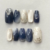 24-piece Y2K gradient blue French press-on false nails with gold moon and star designs, almond shape by HSF Marketplace