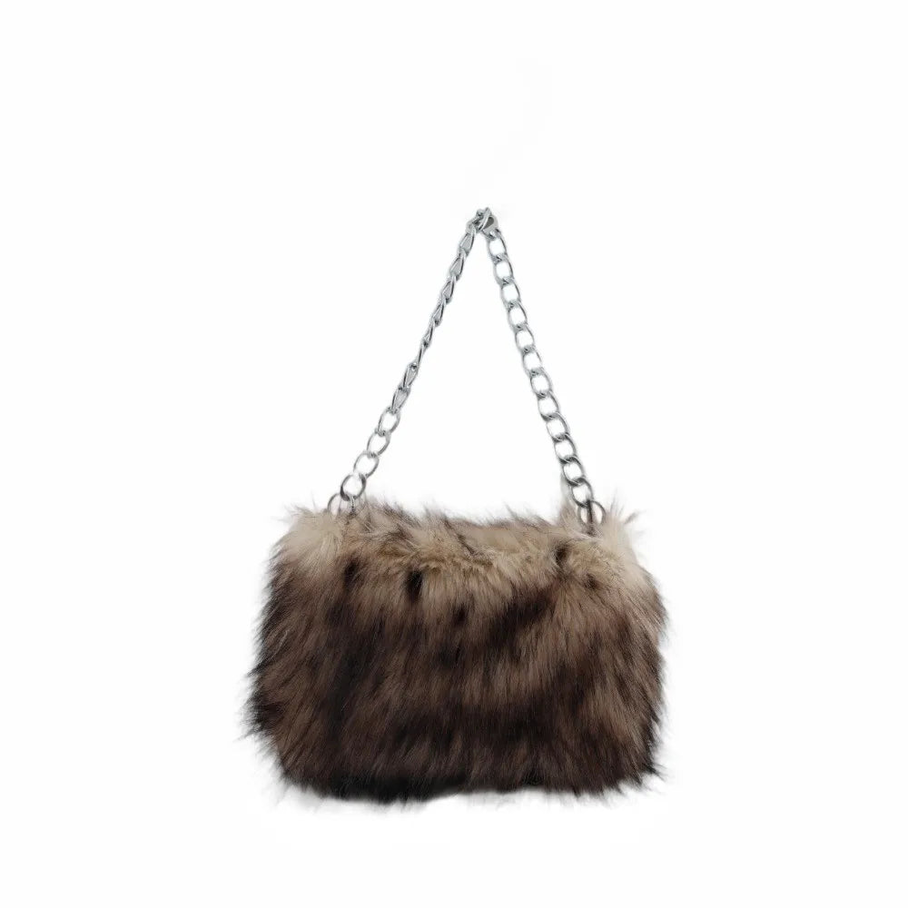 Luxury leopard print handbag with soft chain shoulder strap, large capacity underarm purse for women, from HSF Marketplace.