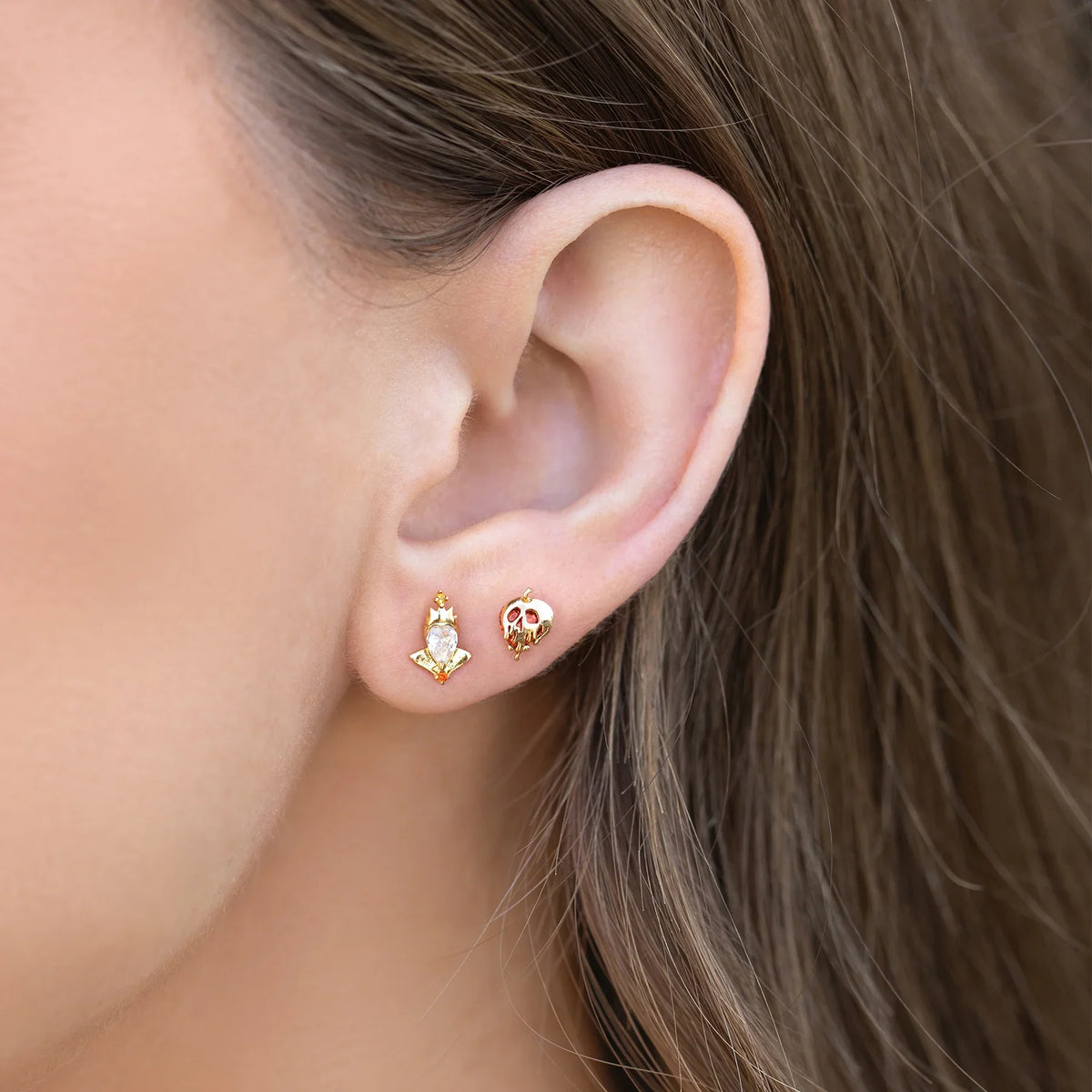 Movie villain gold color cubic zirconia stud earrings for women and girls by HSF Marketplace