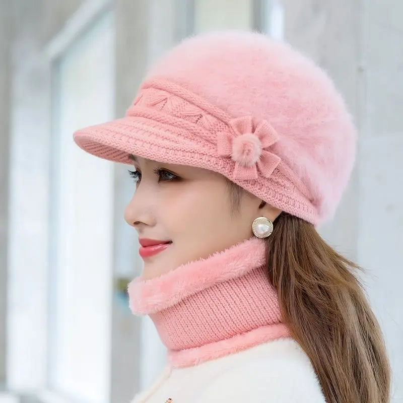Warm knitted women’s winter hat, scarf and gloves set in soft coordinating colors