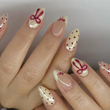 Pink almond false nail patches with bowknots, love hearts and pearl designs, 24-piece Korean press-on nail set
