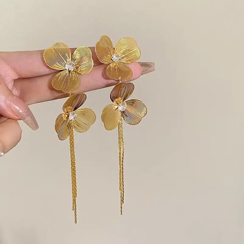 Trendy flower drop earrings with long tassels and rhinestones by HSF Marketplace