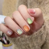 24-piece cute girly short square false nails with white French tips, glitter stars, rhinestones, cat-eye accents and bows