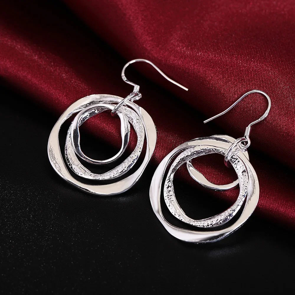 925 sterling silver hoop earrings for women, showcasing a trendy and elegant polished design