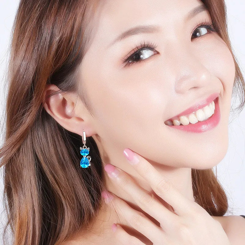 Cute cat hoop earrings with zircon accents for women, shown as stylish jewelry in a close-up product image
