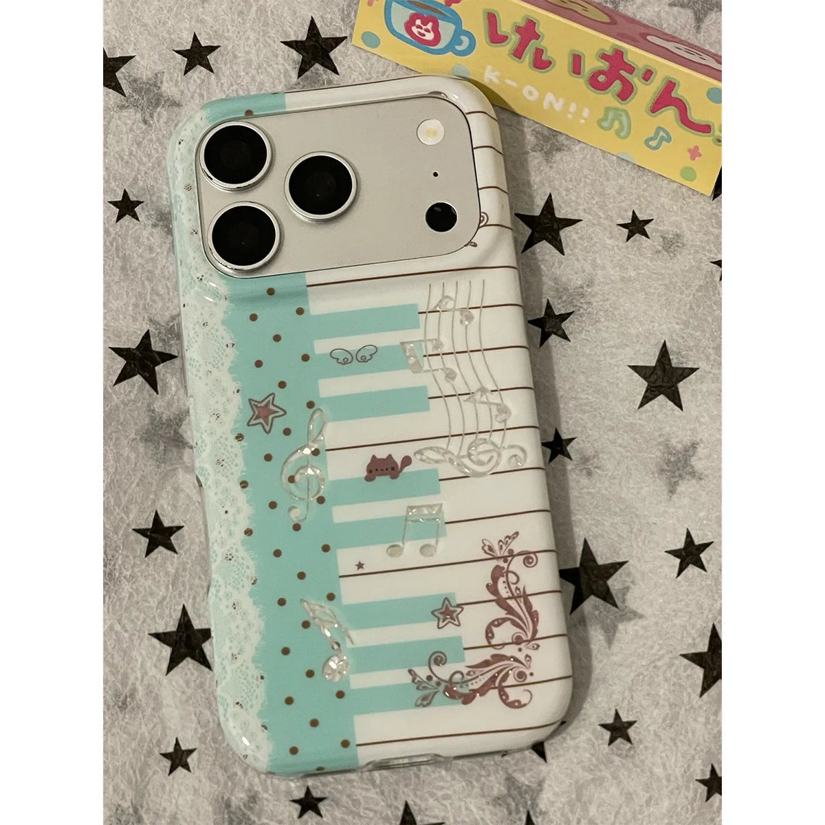 Mint green kitten piano keys phone case for iPhone models by HSF Marketplace