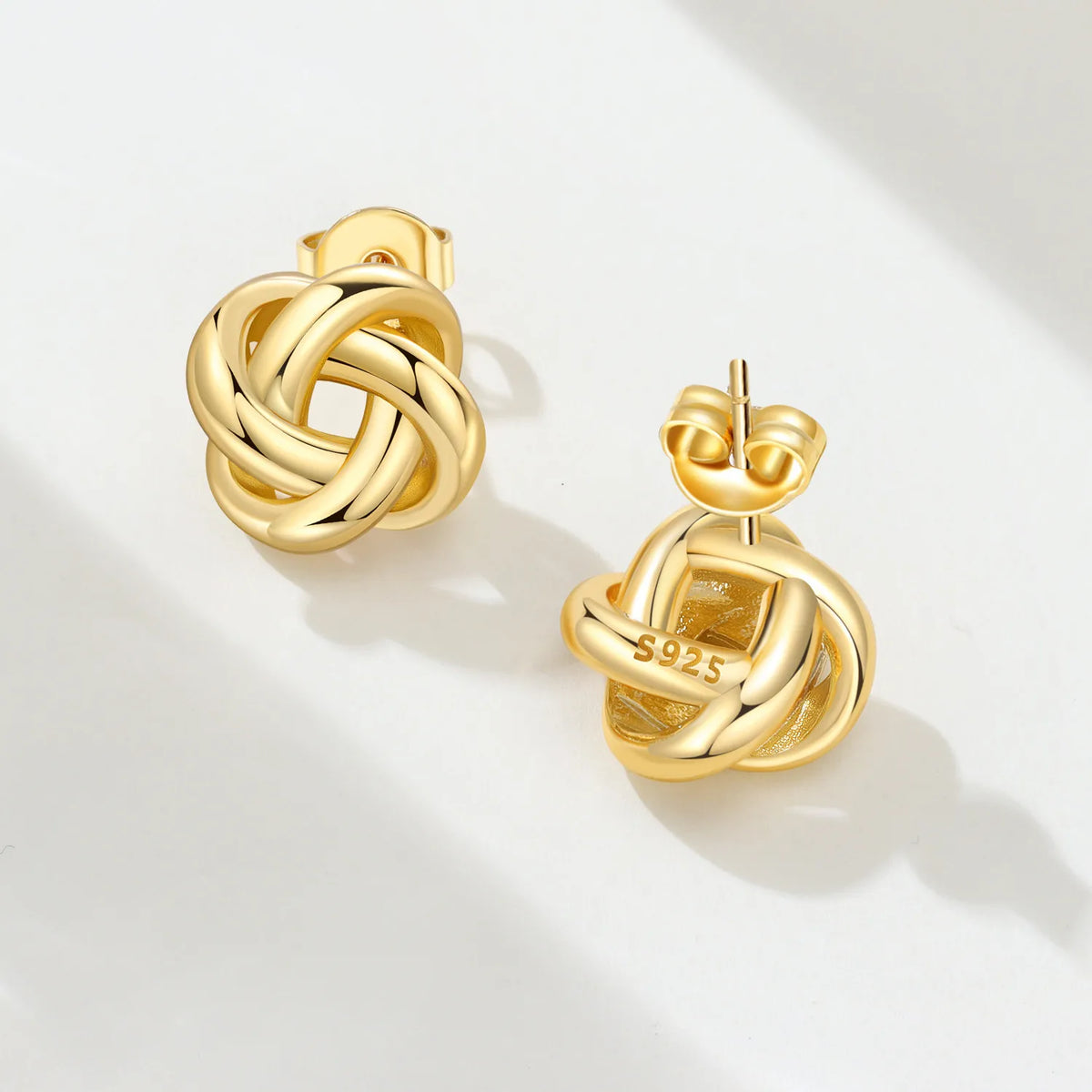 Orstarry S925 sterling silver 18k gold classic knot stud earrings for women, close-up jewelry view