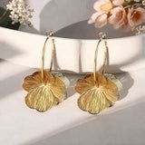 Stainless steel golden double-layer hollow flower hoop earrings by HSF Marketplace for women, vintage floral jewelry