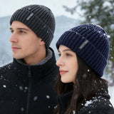 Women's URGENTMAN warm winter beanie hat with plush fur lining and thick knitted design