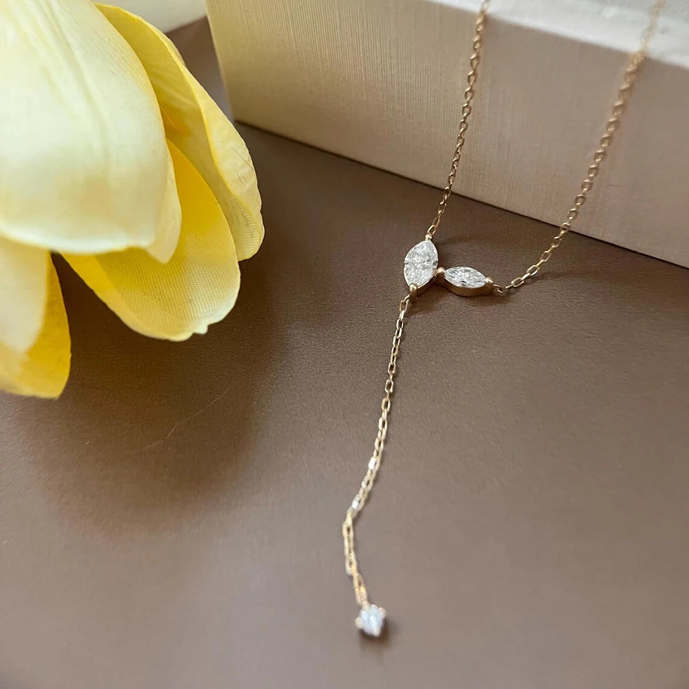 Marquise cut moissanite lariat pendant necklace with silver S925 chain and long tassel, designed for women.