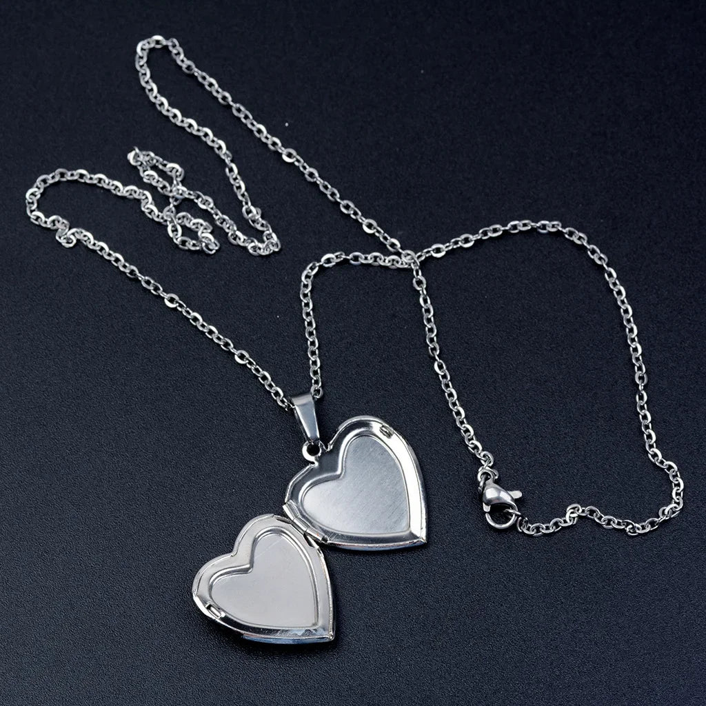 Heart-shaped mood locket necklace by HSF Marketplace, featuring a color-changing temperature-sensitive photo pendant in stainless steel.