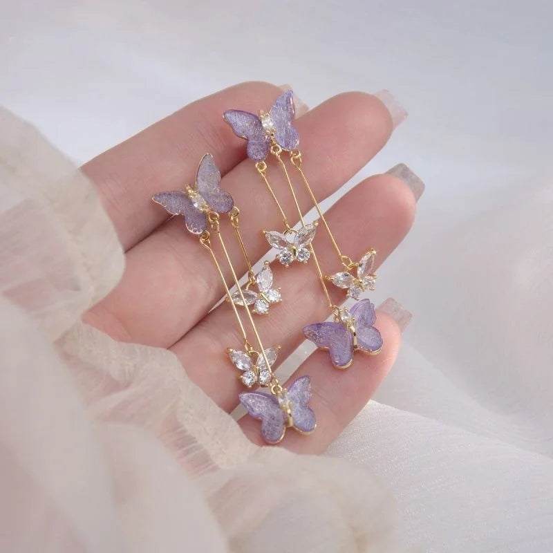 Purple butterfly drop earrings with rhinestone details by HSF Marketplace