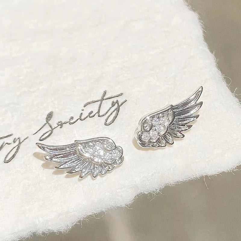 Sparkly full diamond angel wings geometric hollow stud earrings in silver-color metal for women