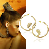 Vintage gold Egyptian queen hoop earrings by HSF Marketplace, elegant jewelry design