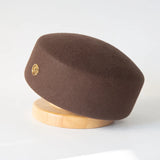 Women's vintage wool felt beret hat with hard concave top, pillbox style for weddings and cocktail parties