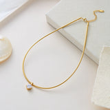 Gold-plated stainless steel cubic zirconia choker necklace for women, waterproof jewelry designed for daily wear and parties.