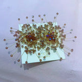 Sparkling snowflake stud earrings with crystal beaded flower design by HSF Marketplace, bridal wedding jewelry