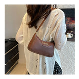 Ladies bow design underarm shoulder bag from HSF Marketplace, stylish handbag for fashion and everyday commuting.