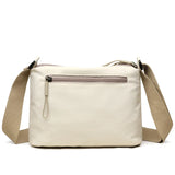 High-capacity HSF Marketplace women’s canvas crossbody bag with three main pockets, ideal for mothers and shopping.