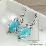 Bohemian turquoise drop earrings for women with vintage silver-style detailing by HSF Marketplace