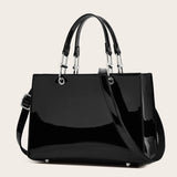Luxury black faux leather handbag for women, designer style from HSF Marketplace, with elegant shape and gold accents.