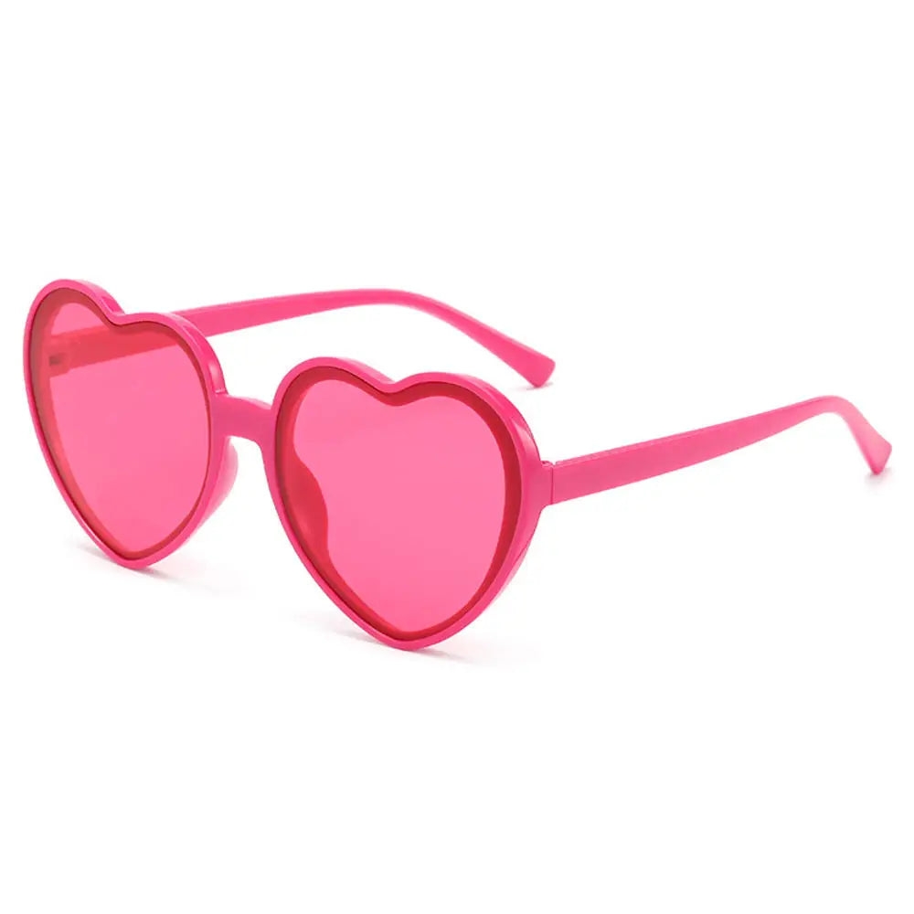 Pink love heart-shaped sunglasses for women with big frames, vintage style, UV400 protection, outdoor fashion eyewear.