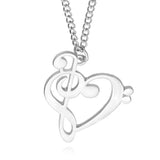 Silver music note heart necklace featuring treble and bass clef charms, infinity love pendant, stainless steel jewelry for women